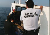 Bay Mills Conservation Officer Inspects Tribal Fishing Vessel